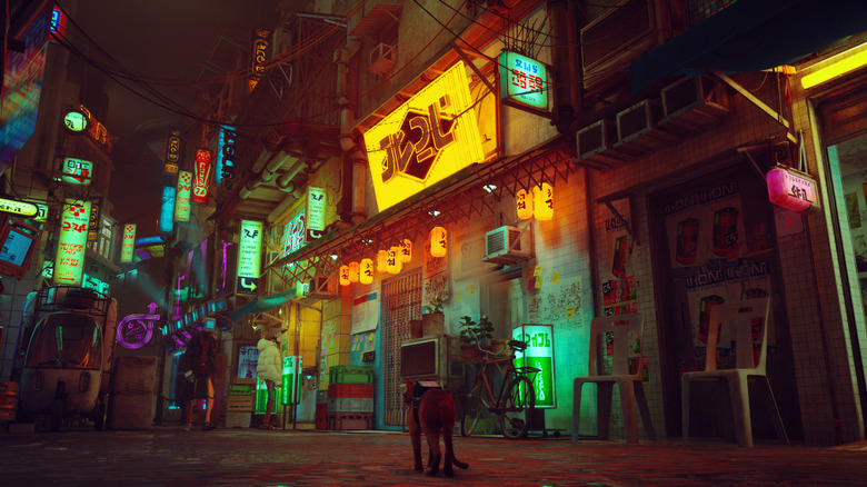 The cat walks down a neon-lit street