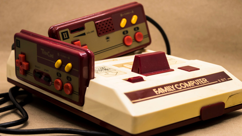 Famicom original with controllers attached