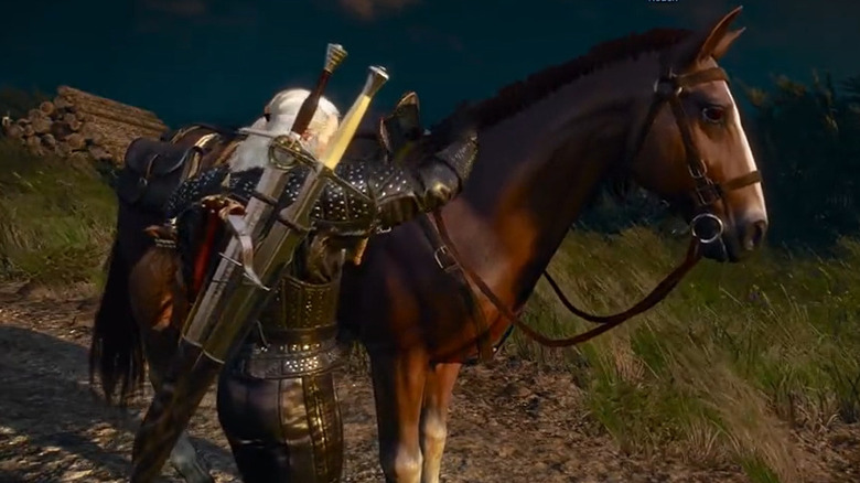 Geralt petting Roach