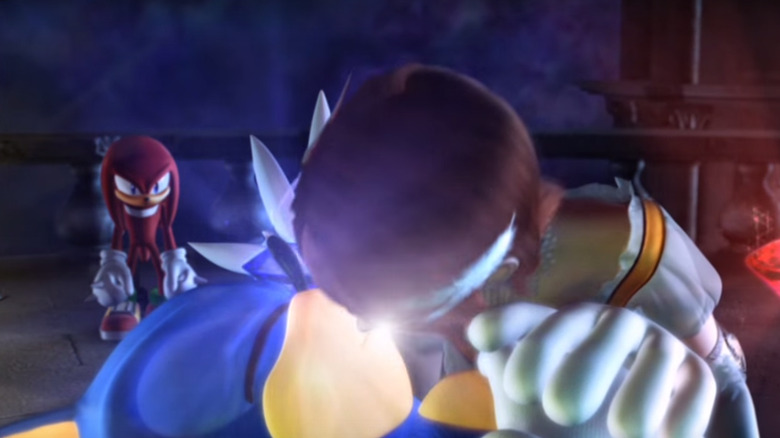 Sonic and Princess Elise kiss as Knuckles watches