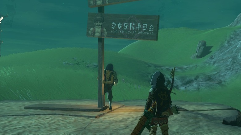 Link looking at Addison holding sign
