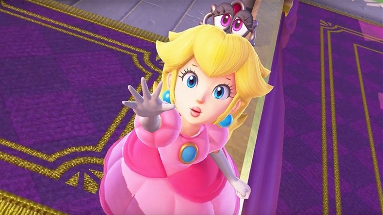 Peach reaches out with a sad look in her eyes