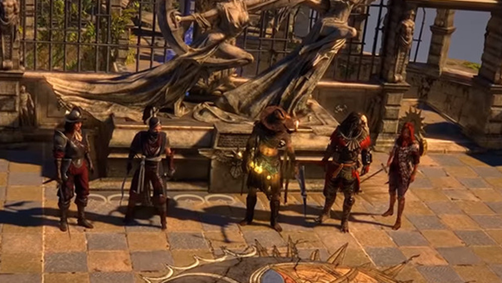 5 armored people stand before statue