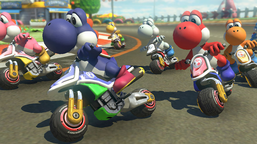 Colorful Yoshis ride karts in Mario Kart 8 Deluxe