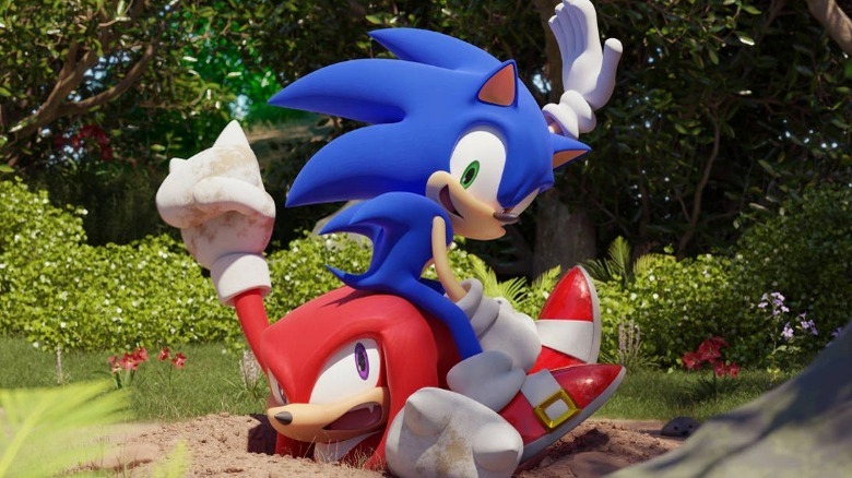 Sonic sitting on Knuckles