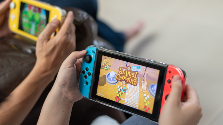 Two people playing Switch