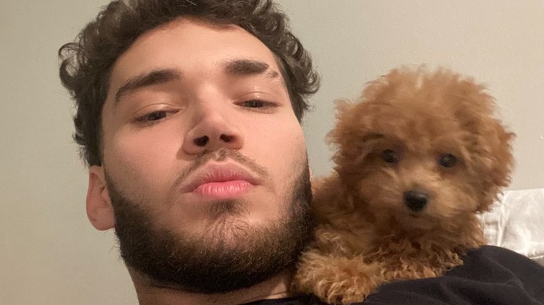 Adin Ross and his dog
