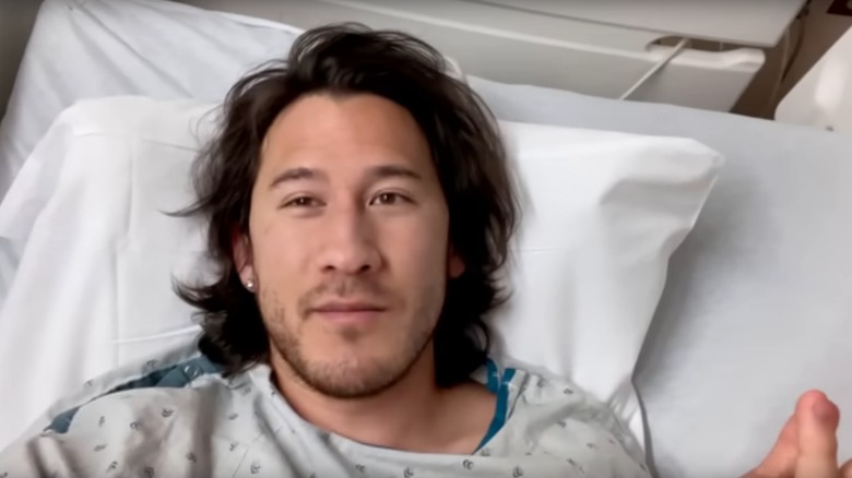 Markiplier lying in a hospital bed