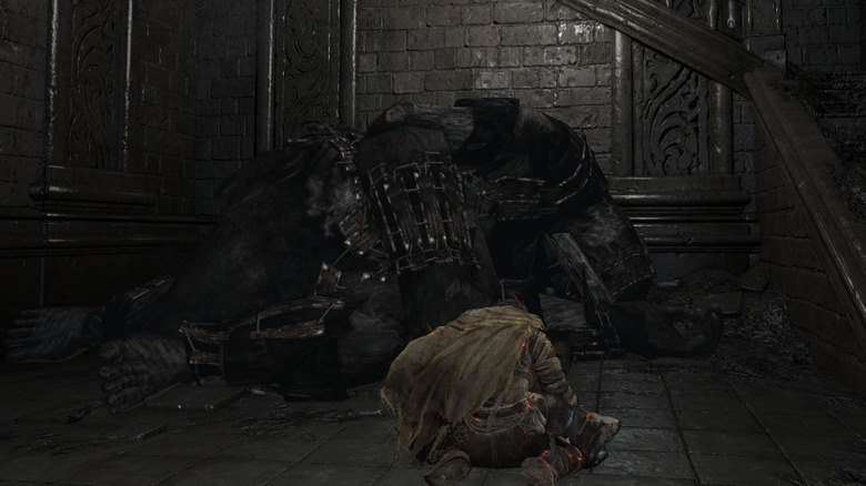 Ashen One kneeling Blacksmith corpse
