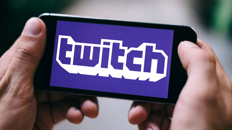 Hands holding phone on Twitch