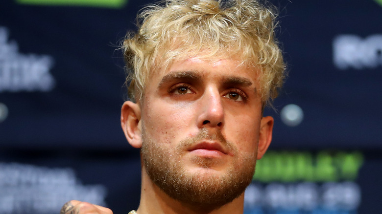 Jake Paul at event with fists