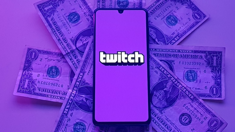 Twitch logo surrounded by money