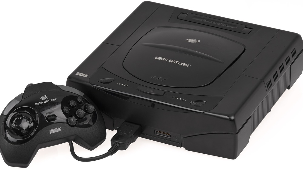 The Sega Saturn and its controller. 