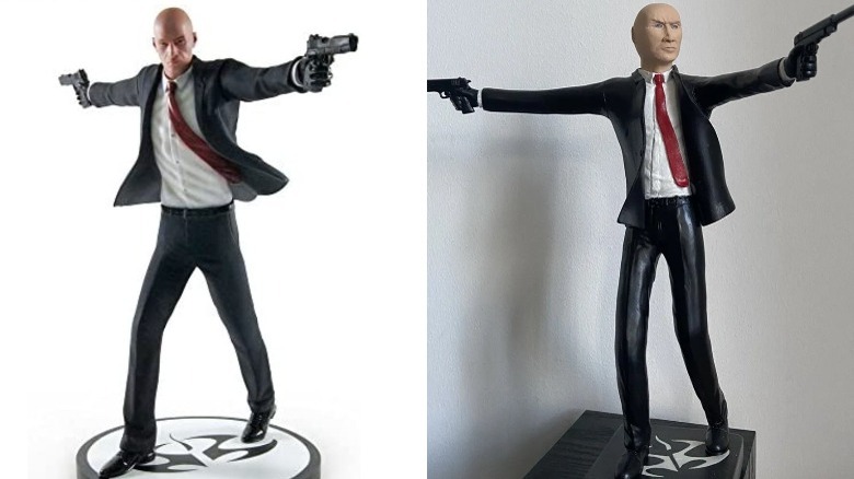 Hitman 47 statues aiming pistols