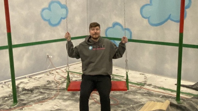 MrBeast sits on giant swing