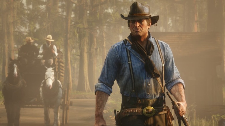 Arthur Morgan with carriage behind him