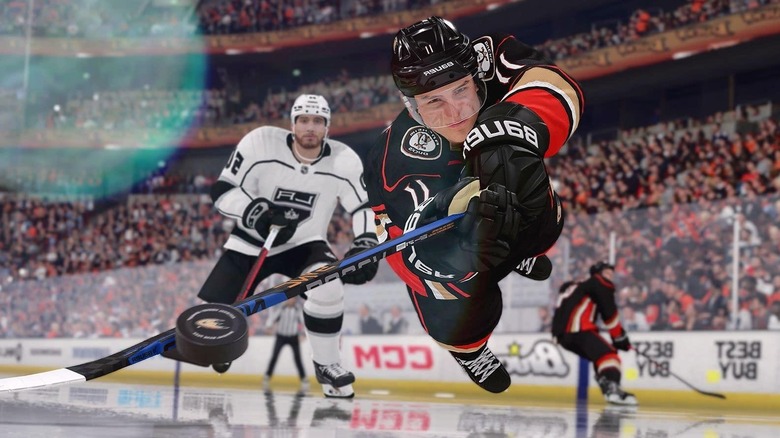 NHL 23 player diving for puck