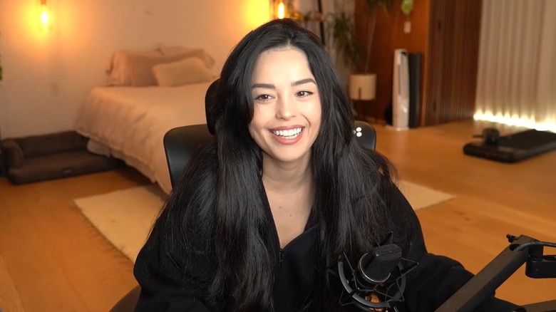 Valkyrae smiling at desk