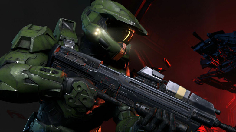 Master Chief aiming an assault rifle