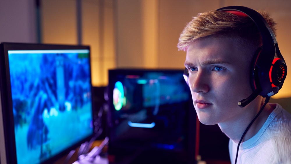 Gamer looking concerned at screen