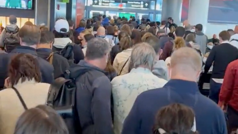 Passengers evacuating airport