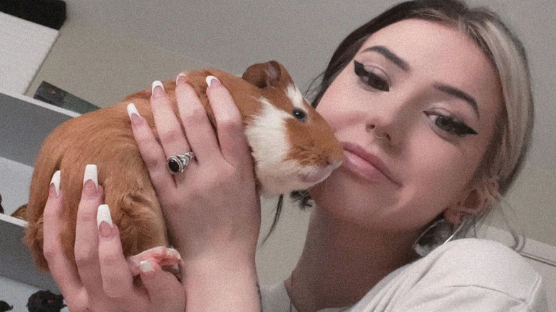 Kalei with pet guinea pig Oliver