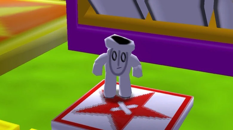Glover standing on button