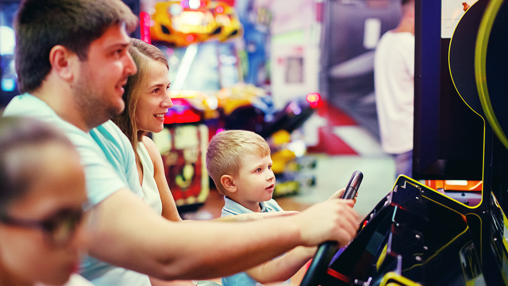 Parents and kids enjoying arcade games