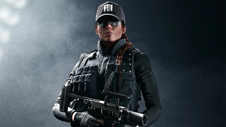 Ash wearing FBI gear