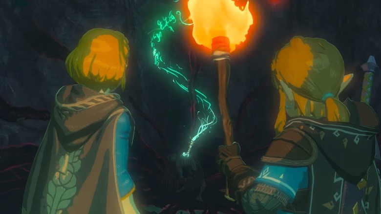 Link and Zelda examining magic