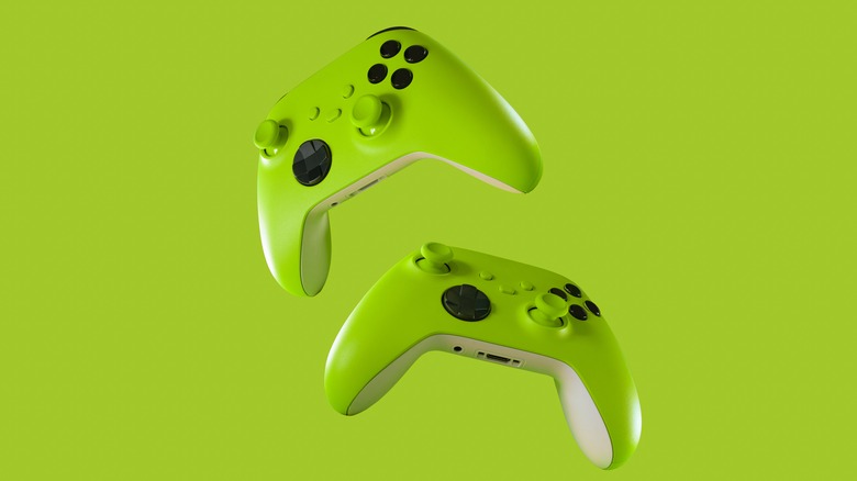 Green Xbox controllers green background