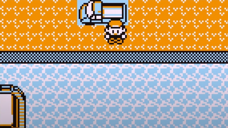 Player character next to truck in Pokémon Red