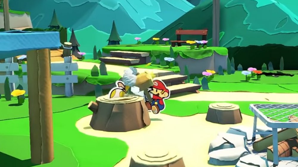 Mario rescuing a Toad in Paper Mario: The Origami King