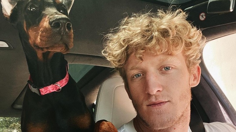 Tfue with a dog in the car
